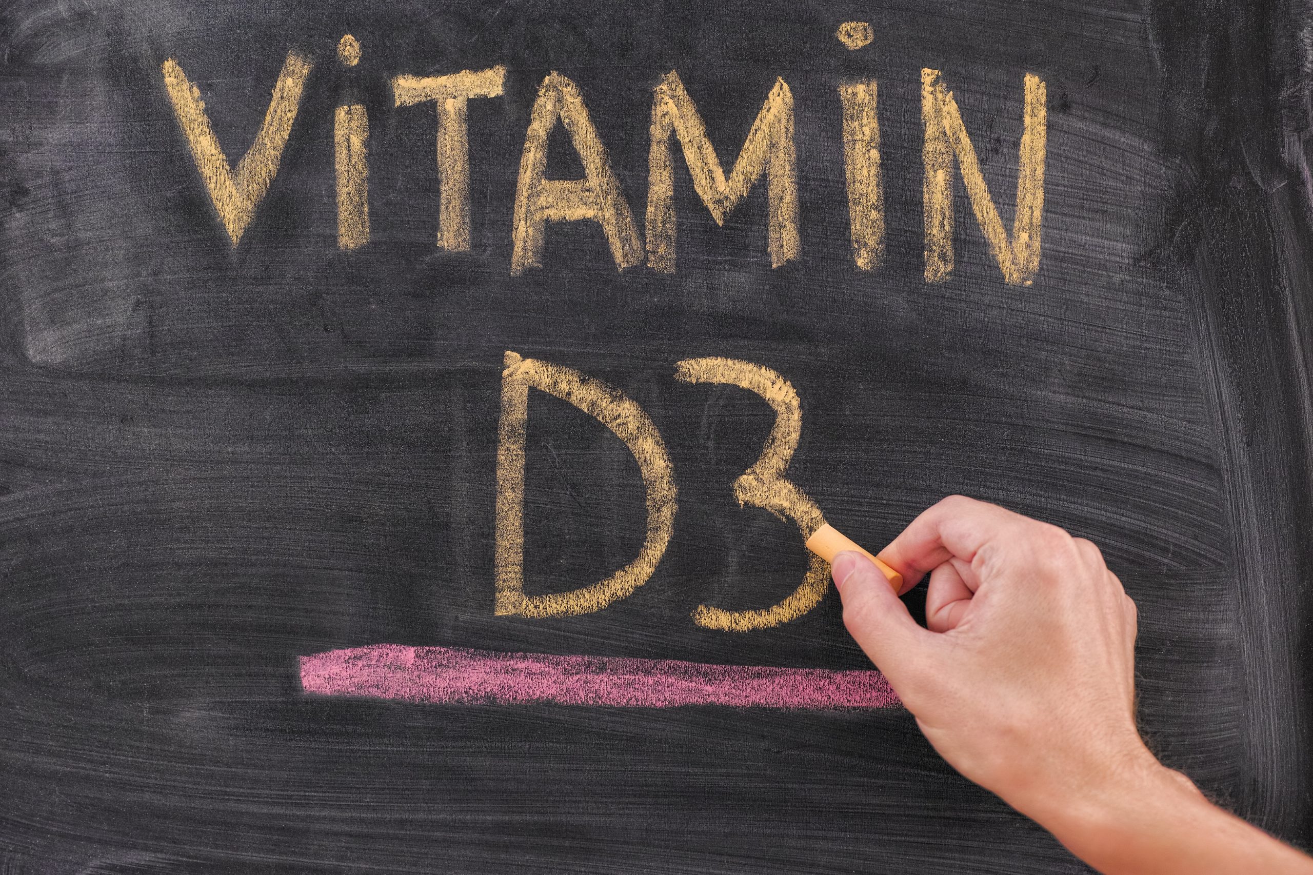 Handschriftliches Vitamin D3 auf Kreidetafel